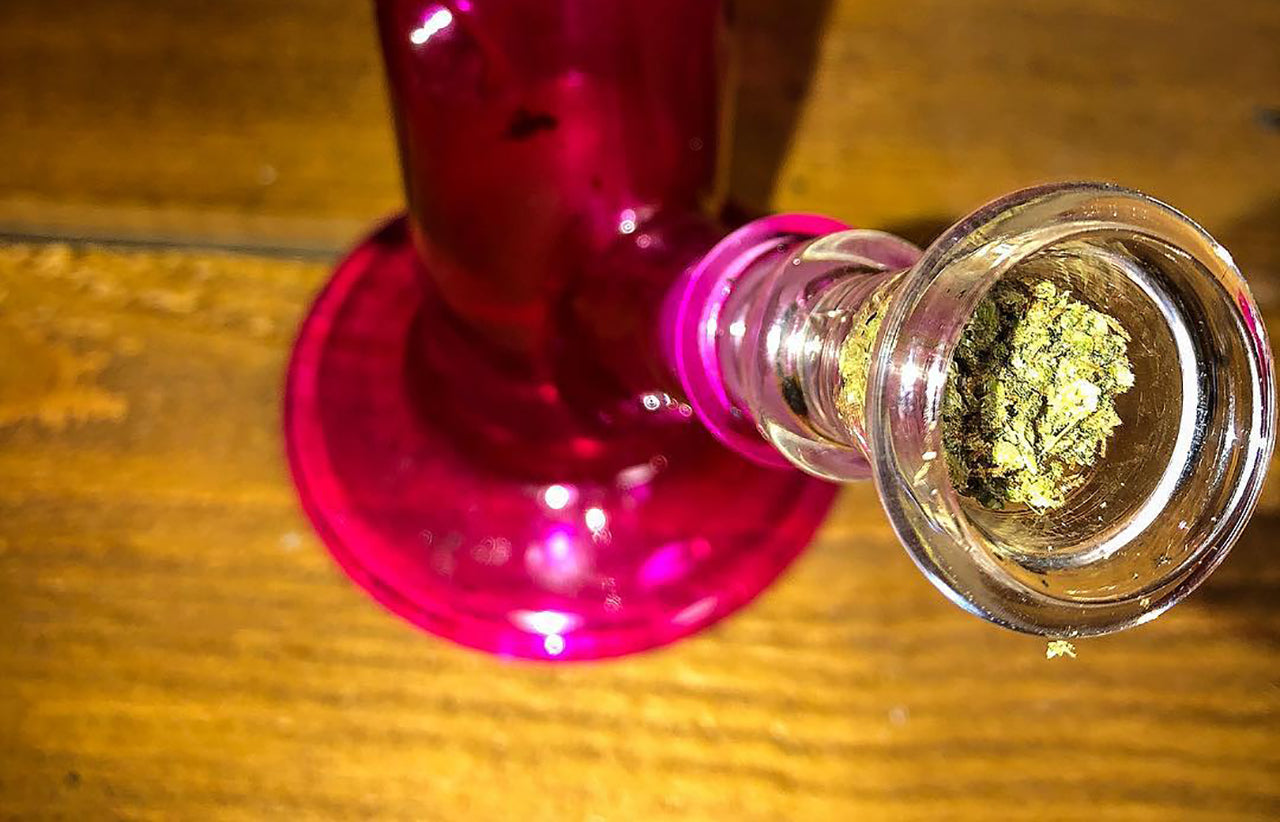 Close up of the Bowl on a hot pink girly bong, image courtesy of MI Bud on Instagram