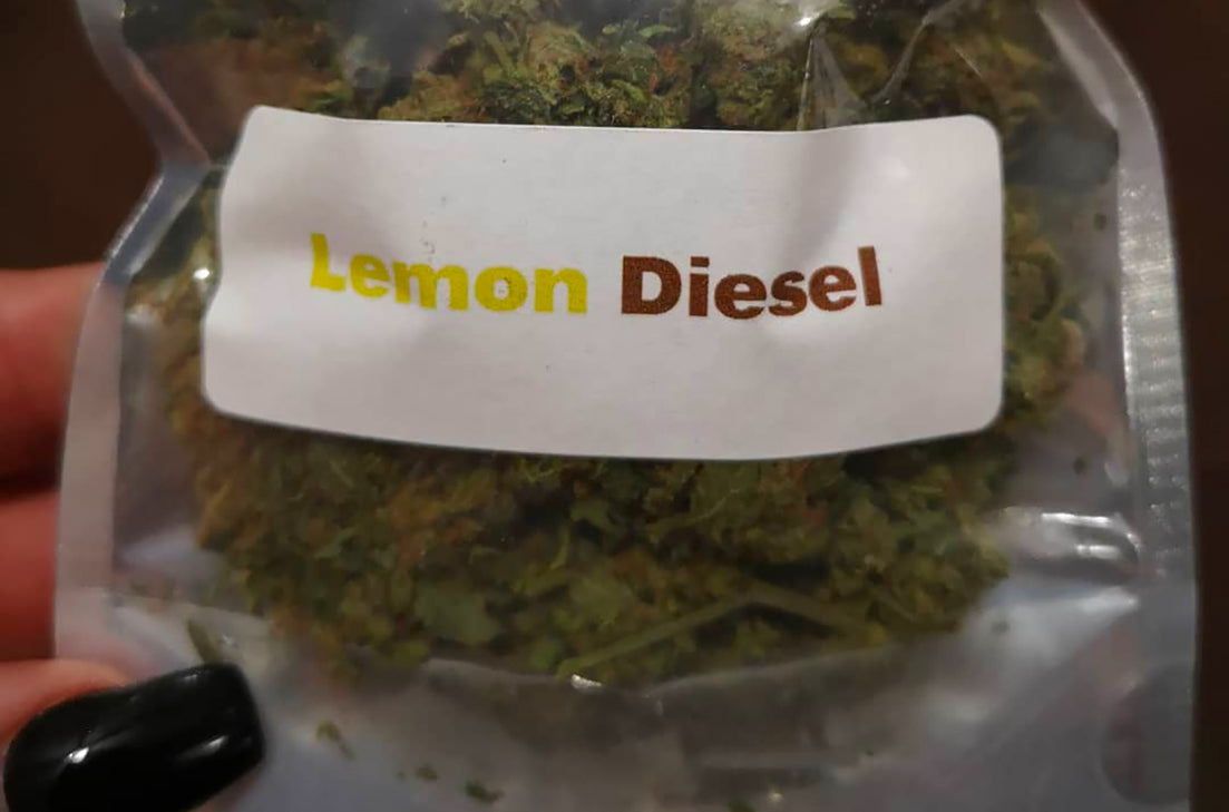 Dispensary bag of Lemon Diesel strain nugs, image courtesy of Inked And Loved on Instagram