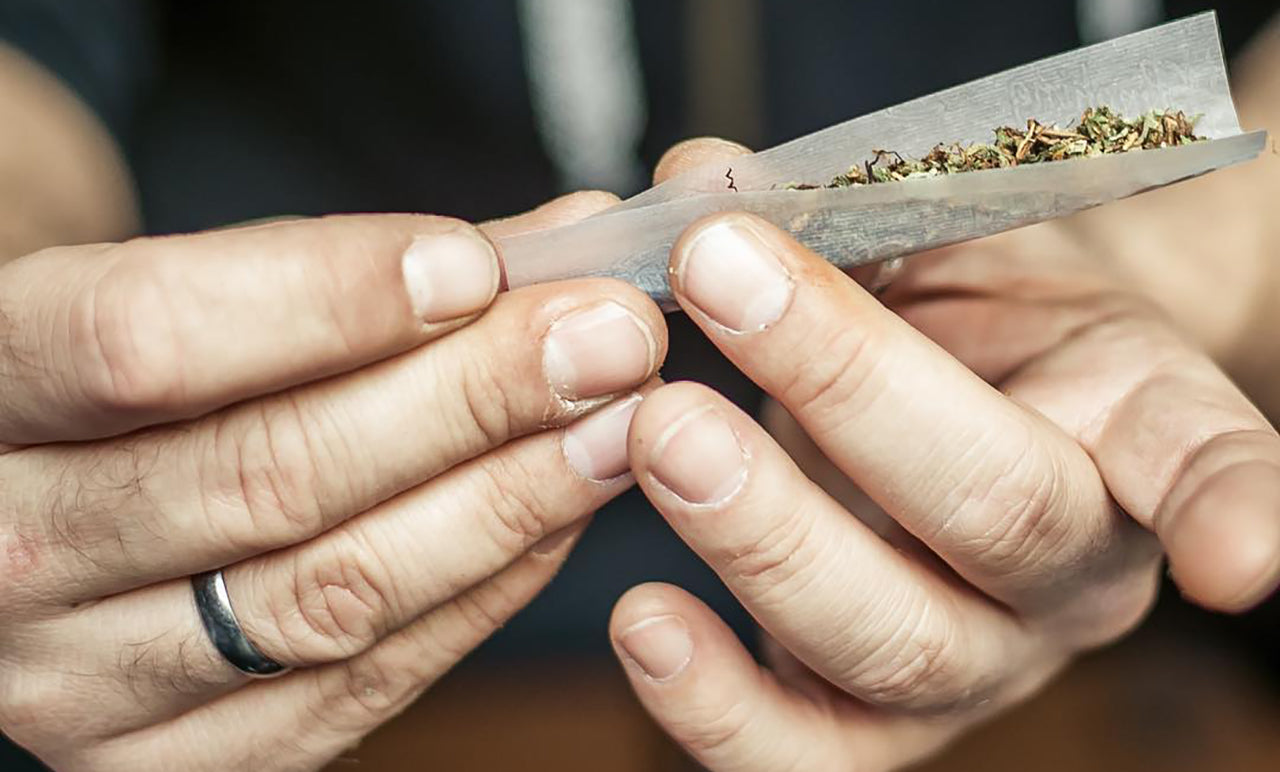 Hand rolling a joint, image courtesy of Cannabis Shows on Instagram